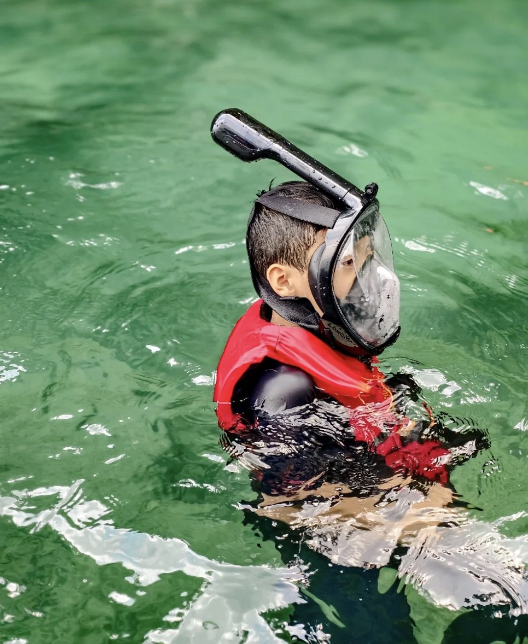 Snorkeling gear laid out on a boat deck for a snorkeling Langkawi trip